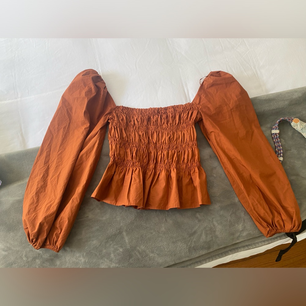 ASTR the label brunt orange smocked square neck puff sleeve top